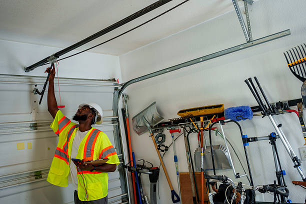 Professional Garage Door Panel Replacement technician working in Reinholds, PA